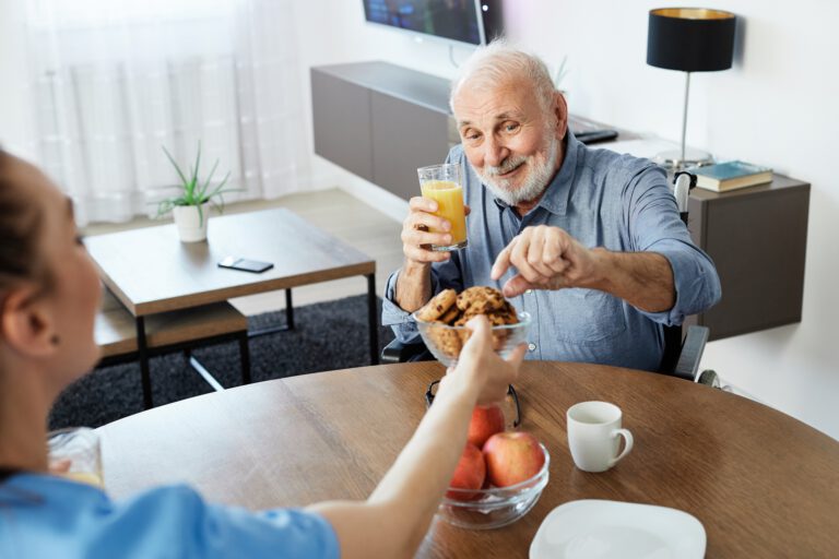 nurse doctor senior care caregiver help assistence wheelchair retirement home nursing elderly man